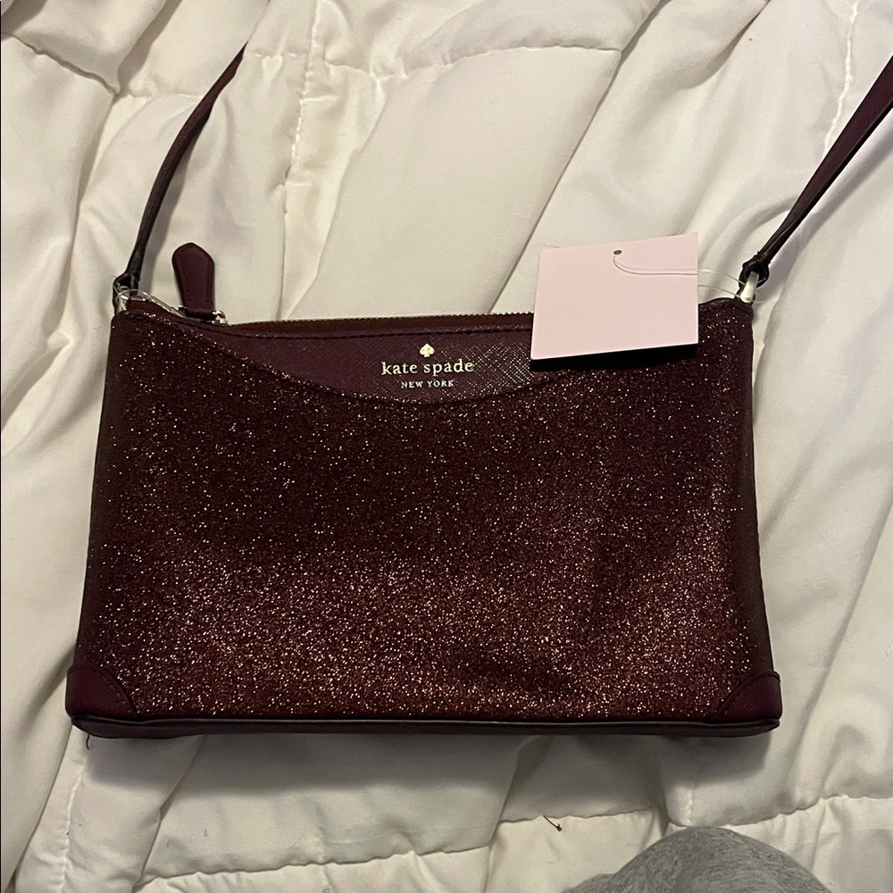 Kate Spade Sparkling Maroon Wristlet